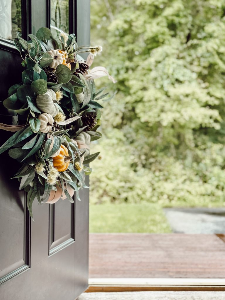 Autumn front door wreath that's charming and rustic.