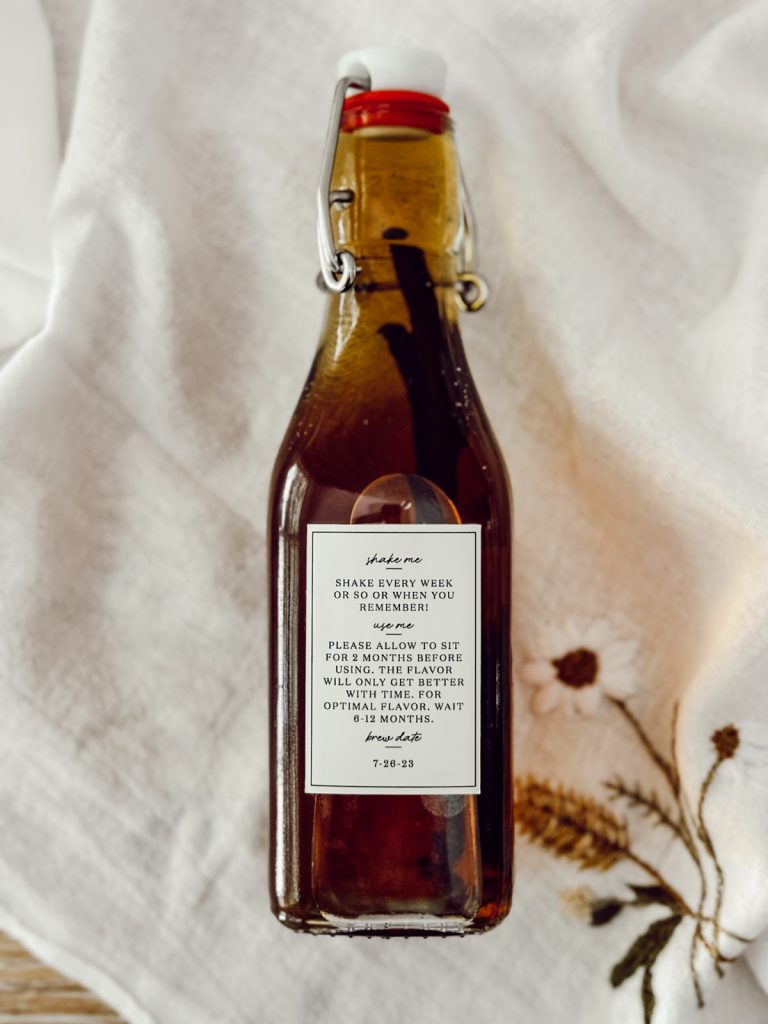 Bottle of extract made with bourbon and vanilla beans.