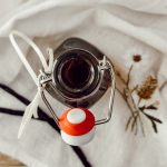 Bourbon extract made at home with bourbon liquor and Madagascar vanilla beans.