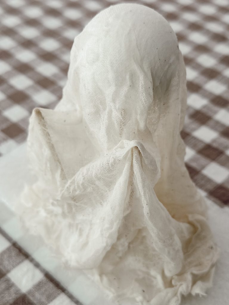 Cheesecloth ghost for Pottery Barn Halloween dupe DIY.