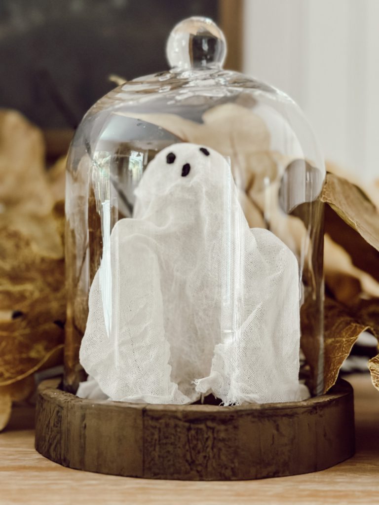 Pottery Barn ghost in a cloche dupe for Halloween decor.
