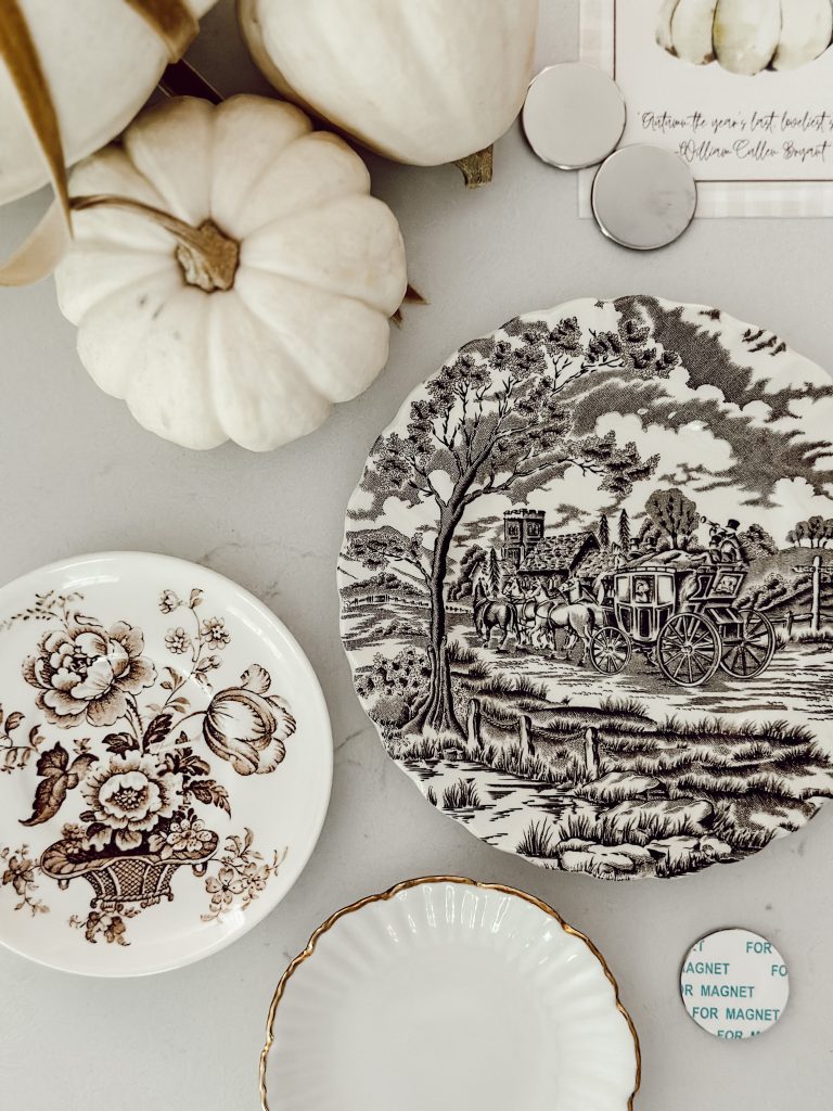 DIY kitchen decor with vintage plates and magnets.