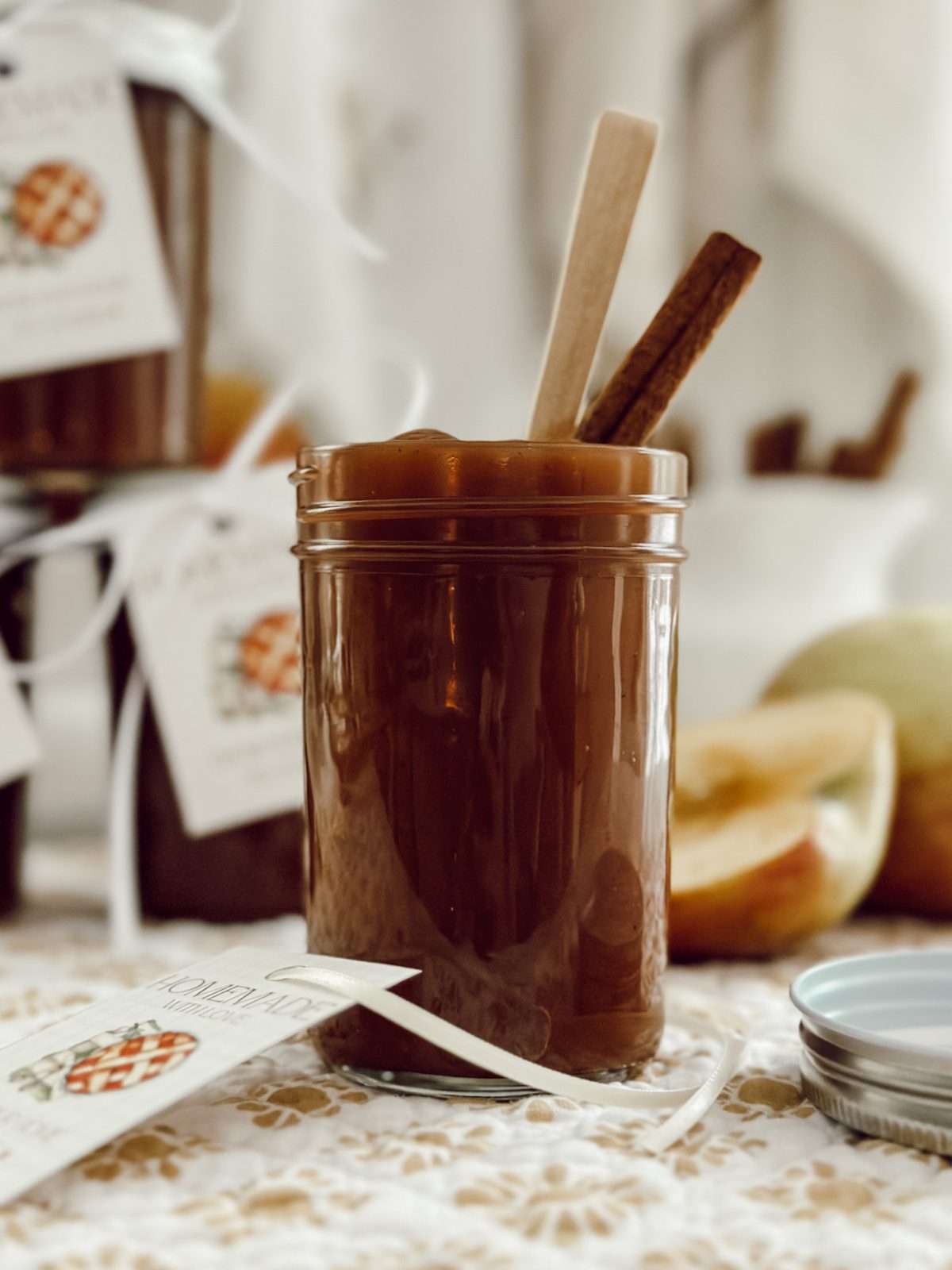 Delicious apple butter recipe made with apples, cinnamon, and ground cloves.
