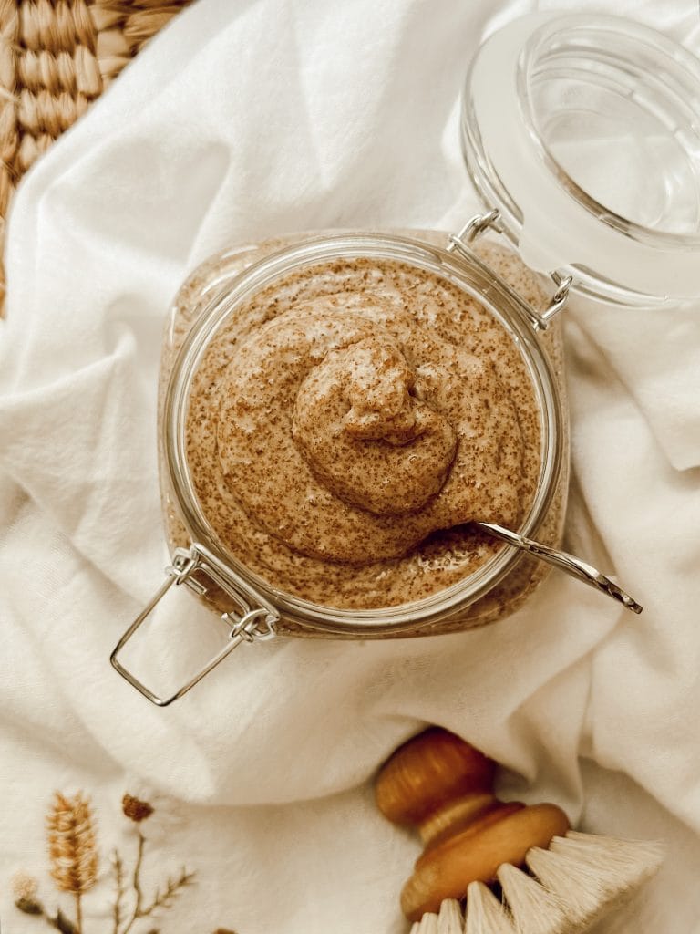 Coconut oil sugar scrub made with natural products for glowing skin.
