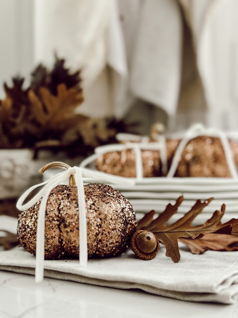 DIY fall home decor with natural elements and sparkles.