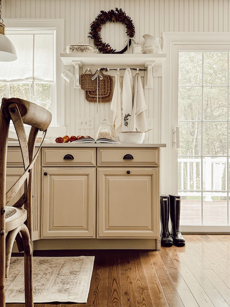 Farmhouse style kitchen with DIY wreath for autumn home decor.