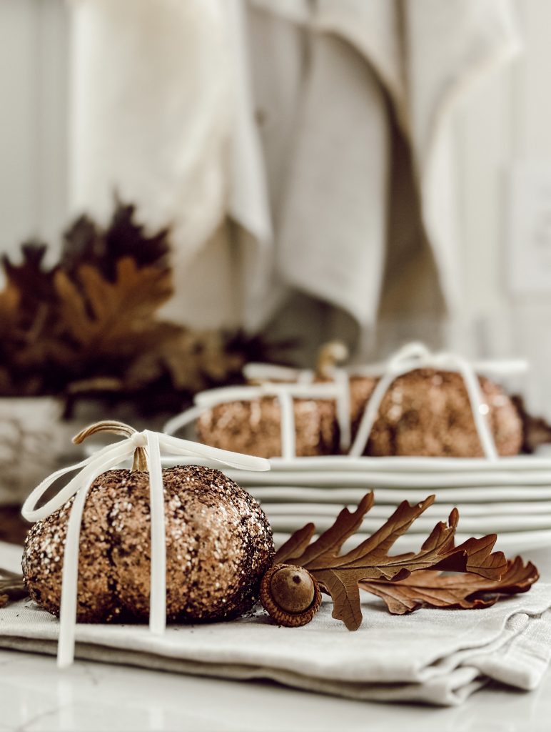 Homemade glitter pumpkins for elegant and sparkly home decor.