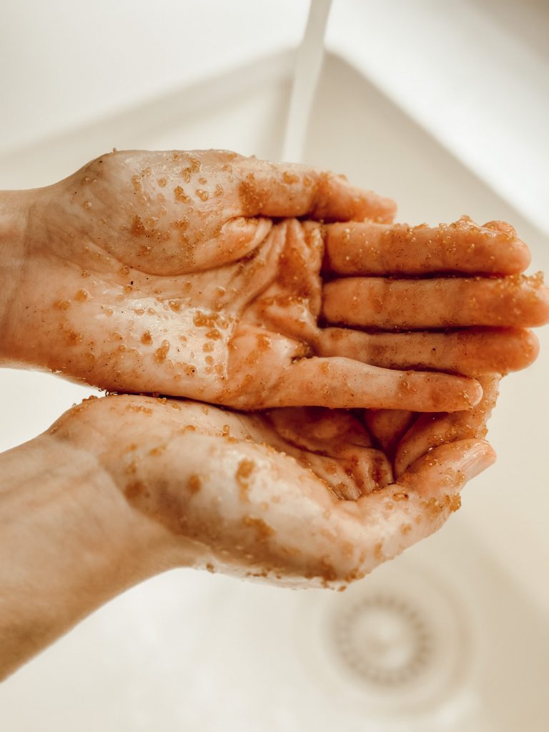 Homemade sugar scrub recipe with organic sugar, oil, and pumpkin spice.