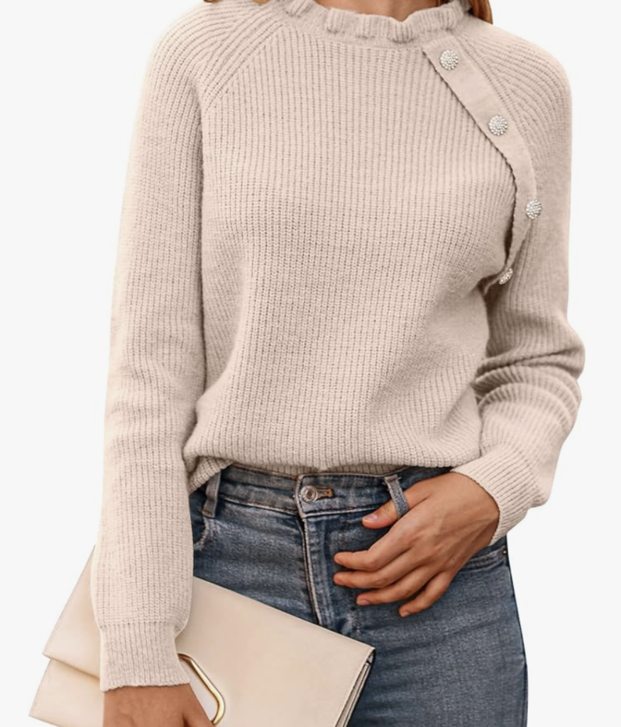 Ruffle knit pullover sweater with buttons.