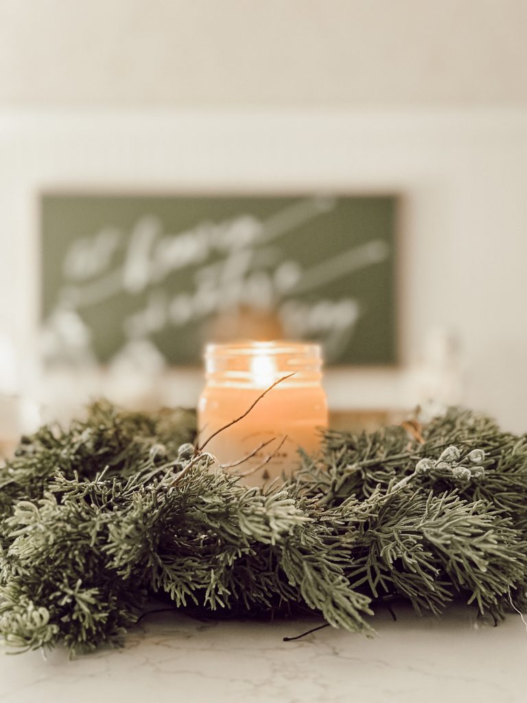 The simplest way to add holiday cheer is with a Christmas scented candle.