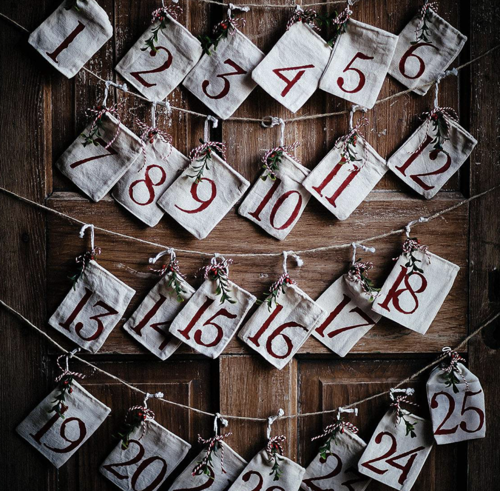 Mini burlap bag Christmas countdown with special treats inside.