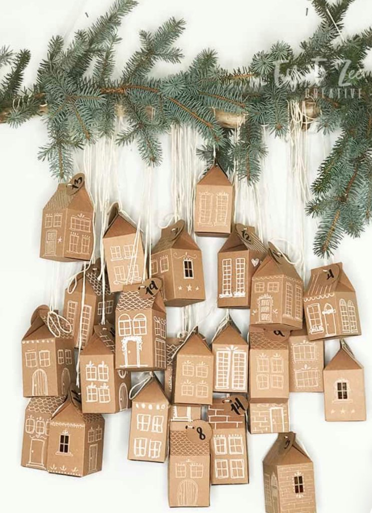 Small cardboard houses Advent calendar for the holiday season. 