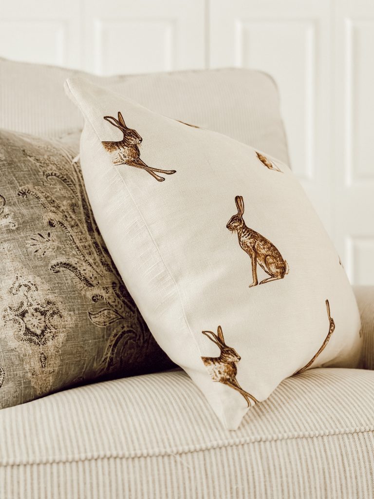 Throw pillows on living room chairs add texture and character to the room.