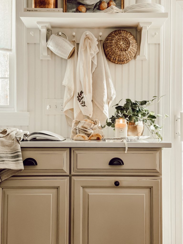 Tea towels in cottagecore kitchen decorations to add warmth & coziness.