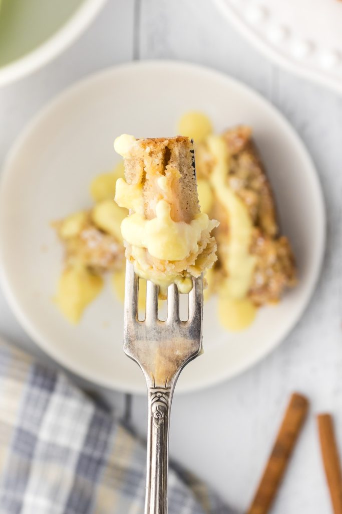 Forkful of Irish apple cake that can be eaten for breakfast or dessert.