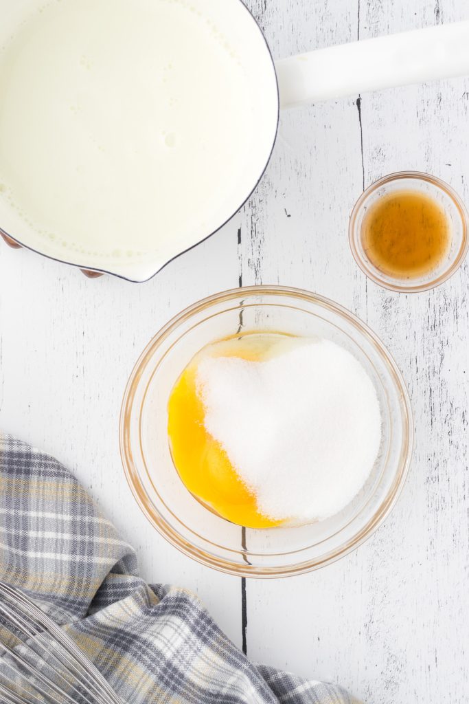 Tempering the eggs for the custard sauce so the sauce is nice and creamy.