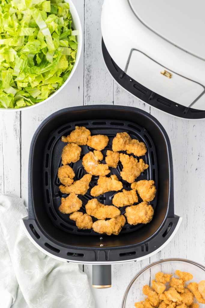 Air fry tender chunks of chicken for this traditional Cobb salad recipe.