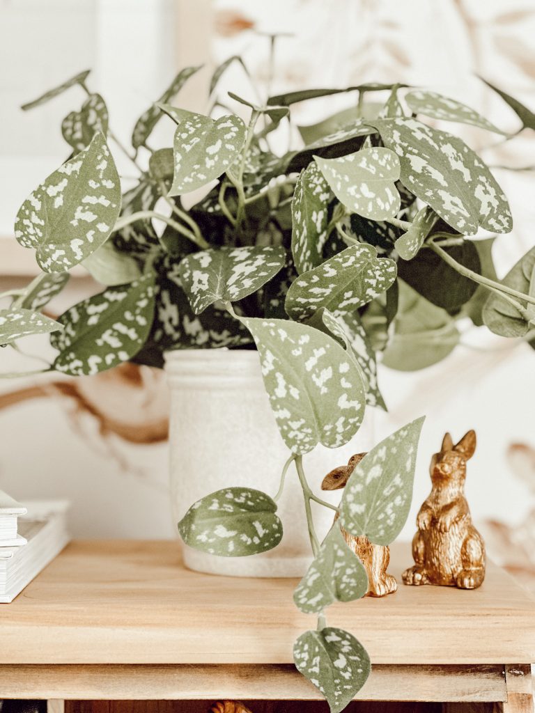 An old desk is the perfect place to add a little greenery to add coziness to your home office.