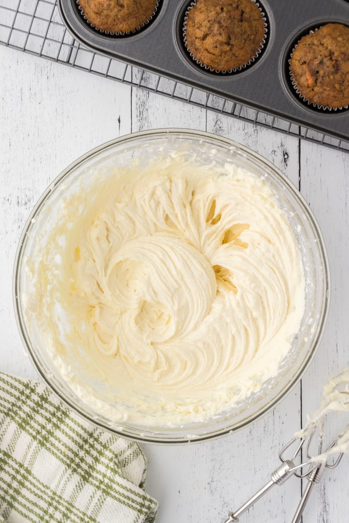 The completed cream cheese frosting for carrot cake cupcakes.
