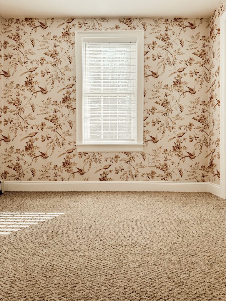 Create a stylish home office with wallpaper and other DIY accents. 