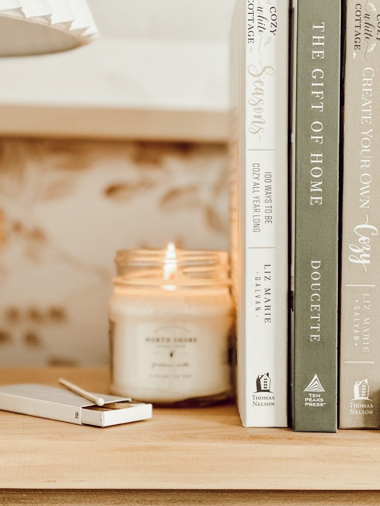 A simple way to make your office feel cozy is by burning a scented candle.