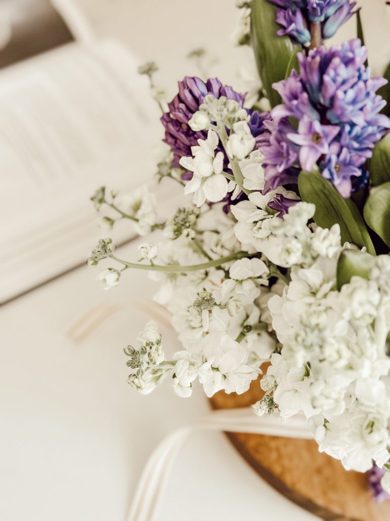 Spring flower arrangement with tiny purple blooms of Hyacinth.