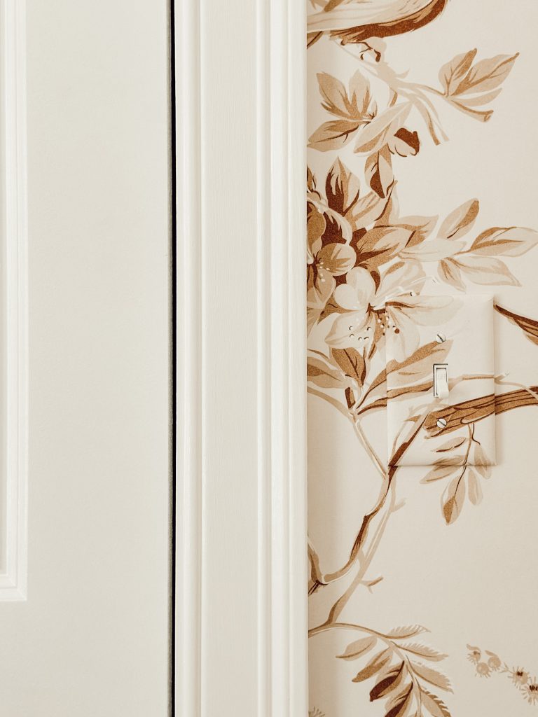 Make your wallpaper look high end by wallpapering light switch and outlet covers.
