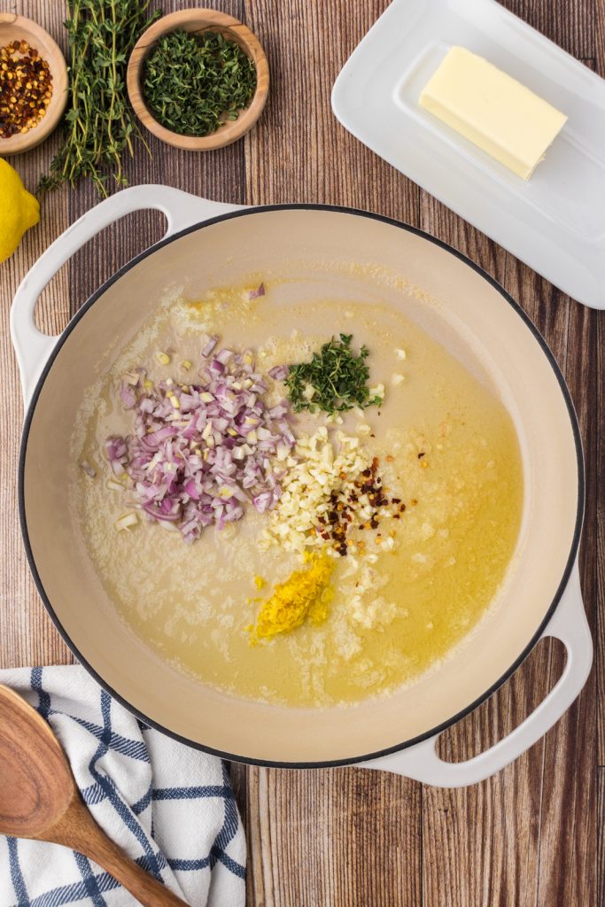 Cook fresh thyme, lemon zest, shallots, and chili flakes in butter to start the sauce.