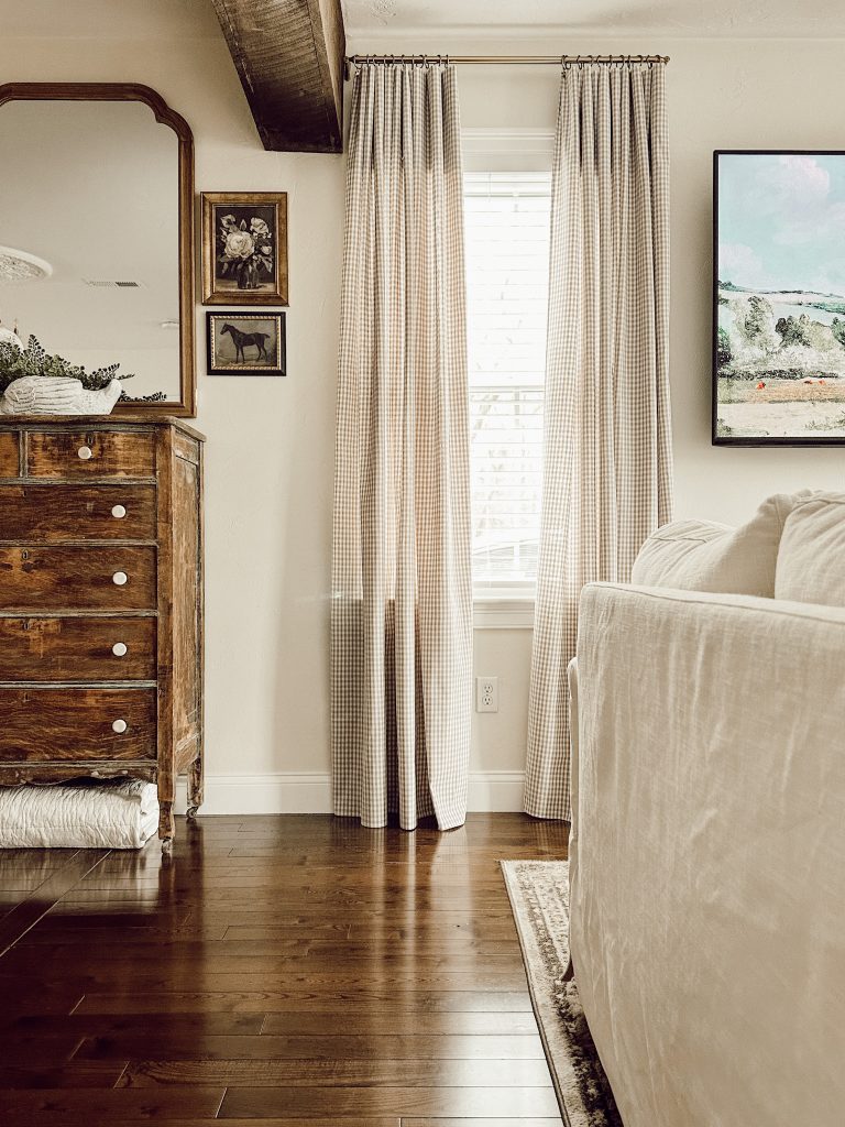 Natural wood dresser in family room to add warmth and coziness to the living space.