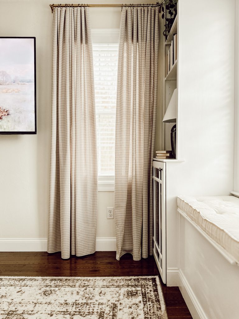 Window treatments made with natural fibers on the windows in living space.