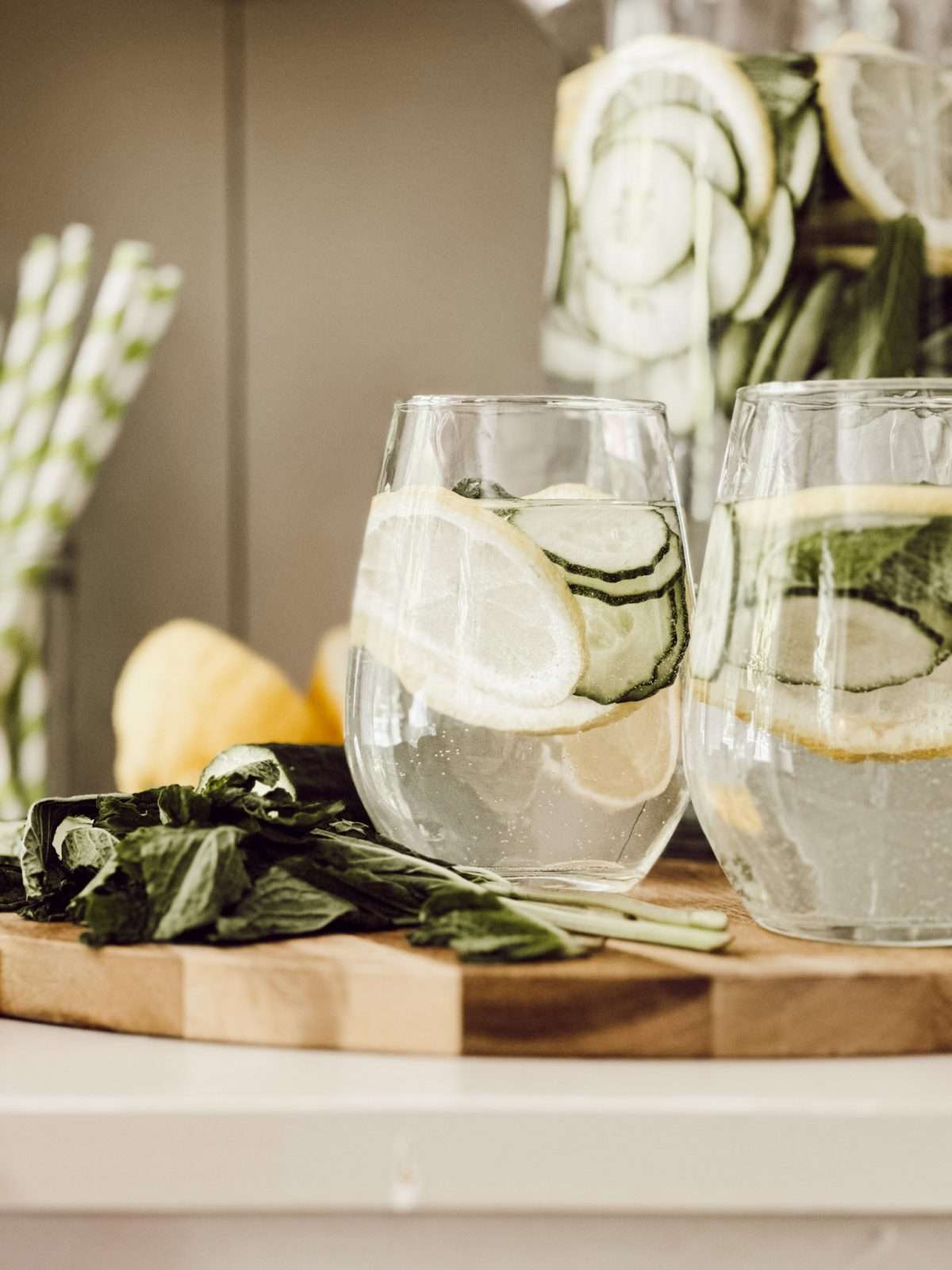 An easy and refreshing summer drink with cucumbers, lemons, mint, and cold water.