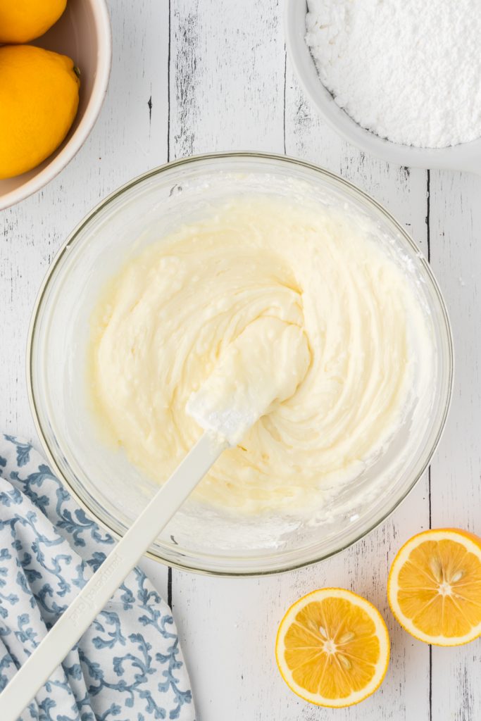 Lemon butter icing for pound cake with lemon juice, powdered sugar, and butter.