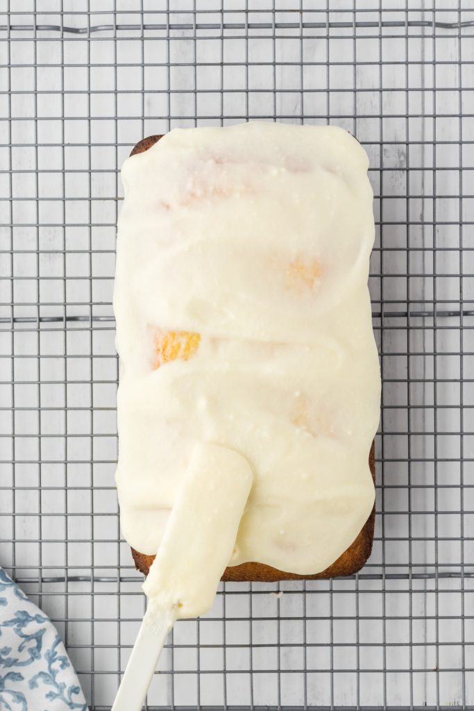 Lemon butter icing on pound cake is a delicious breakfast or dessert treat.
