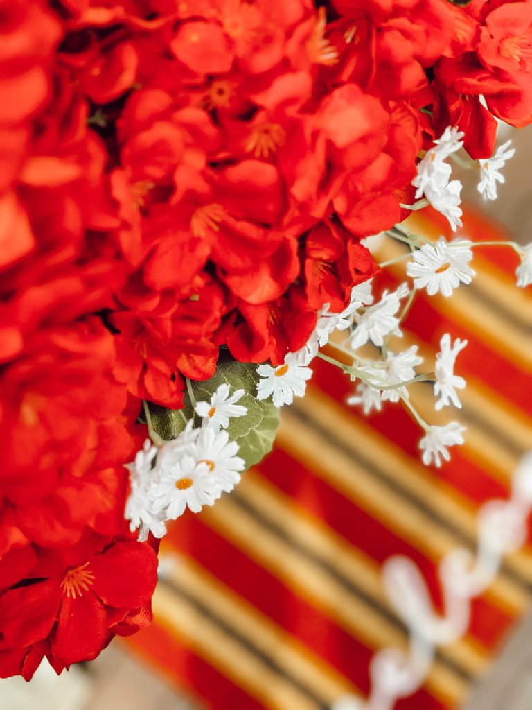 Patriotic doormat for your front door with striped and a fun welcome message.