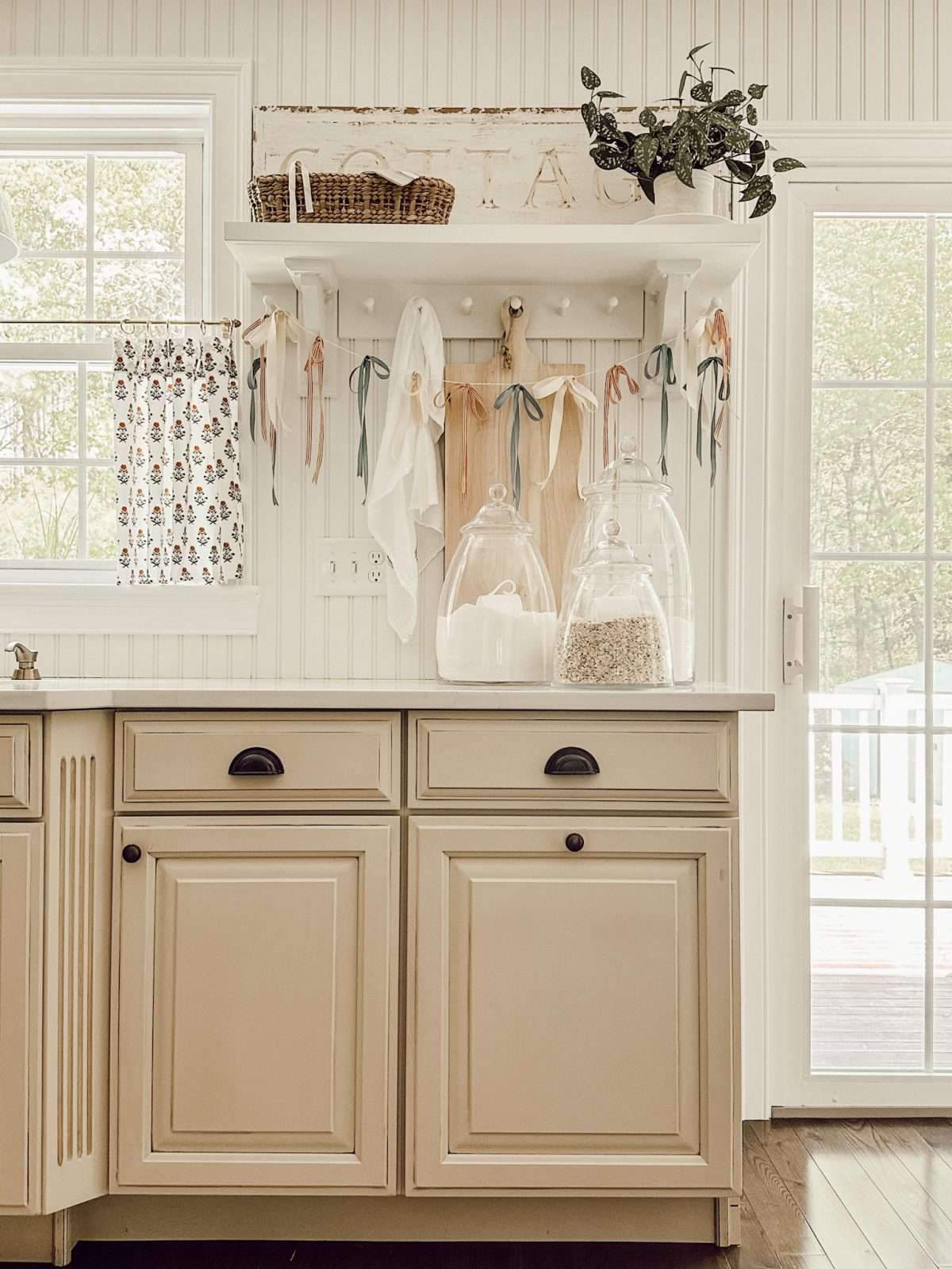 Patriotic kitchen decorations with a DIY garland for the Fourth of July.