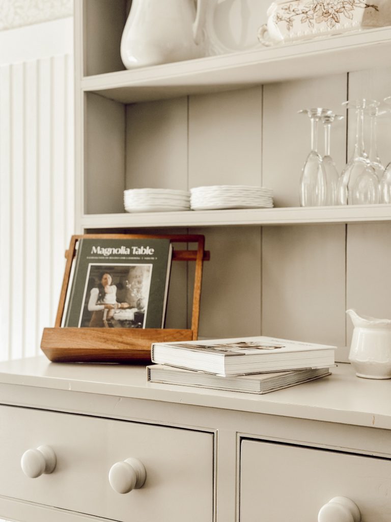 A piece of furniture in the kitchen decorated with functional kitchen decor.