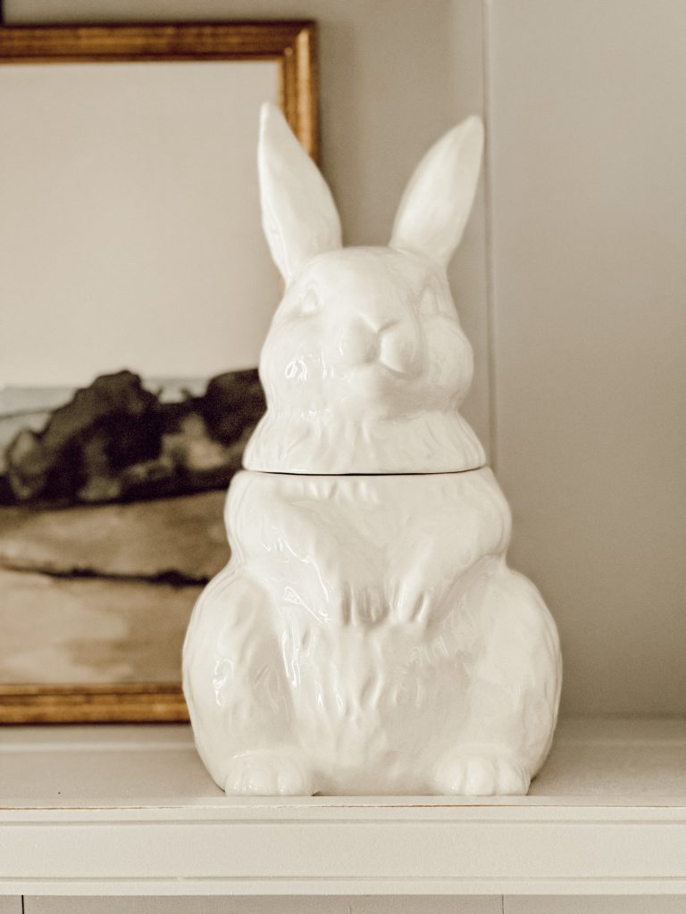 Vintage bunny cookie jar styled on our farmhouse open hutch shelf.
