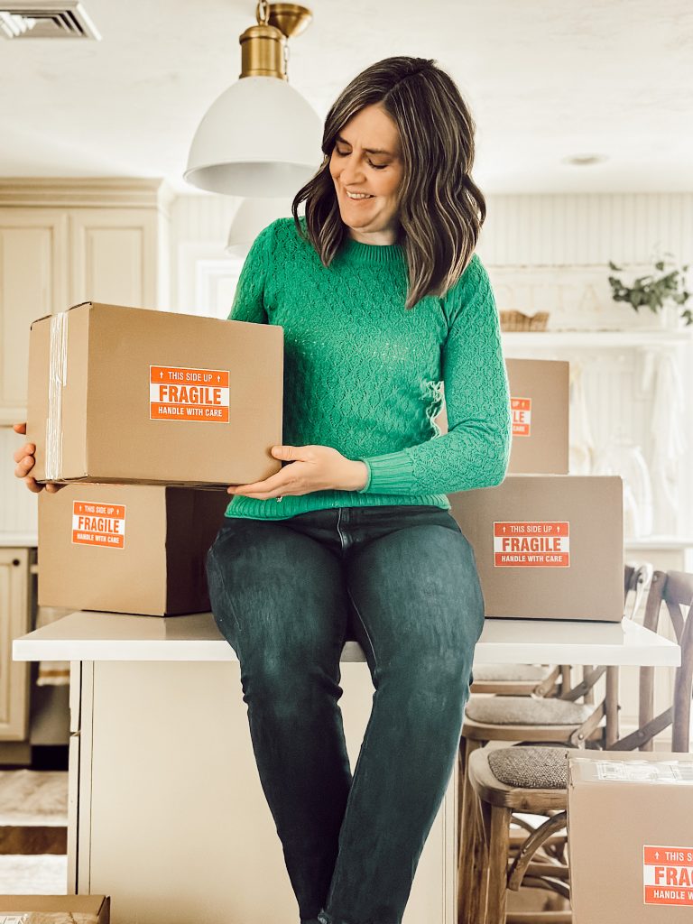 Heidi of Eleanor Rose Home holding the Sweet Home box.