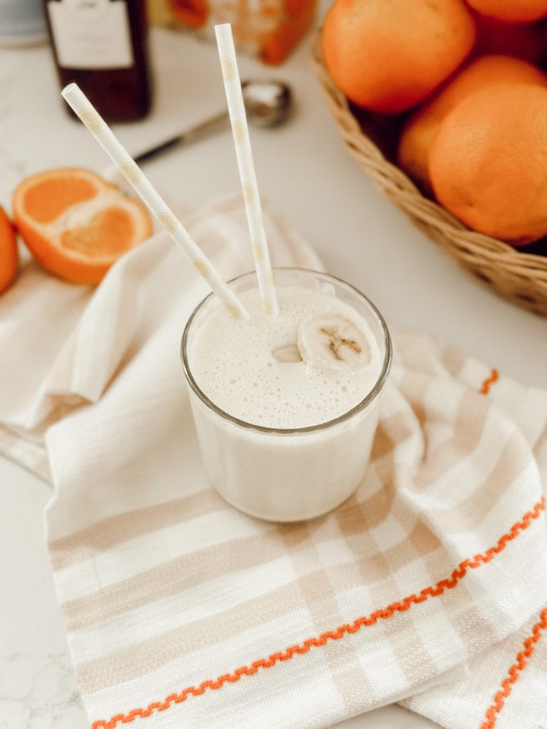A morning drink or afternoon snack with frozen bananas, vanilla Greek yogurt, and fresh oranges.