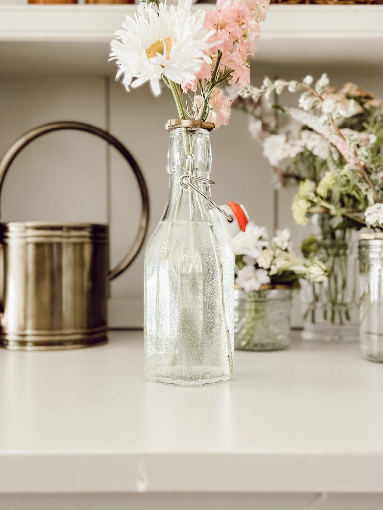 A simple flower arrangement with an air dry clay flower frog.