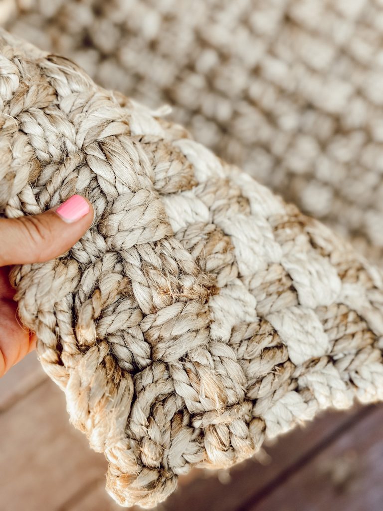 Drew Barrymore hand woven jute door mat at the entrance to our front door.