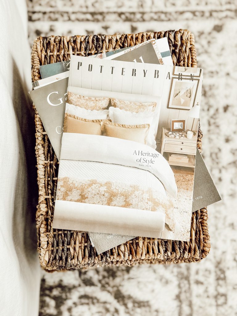 Magazines on wicker basket add a warm touch to the family room.