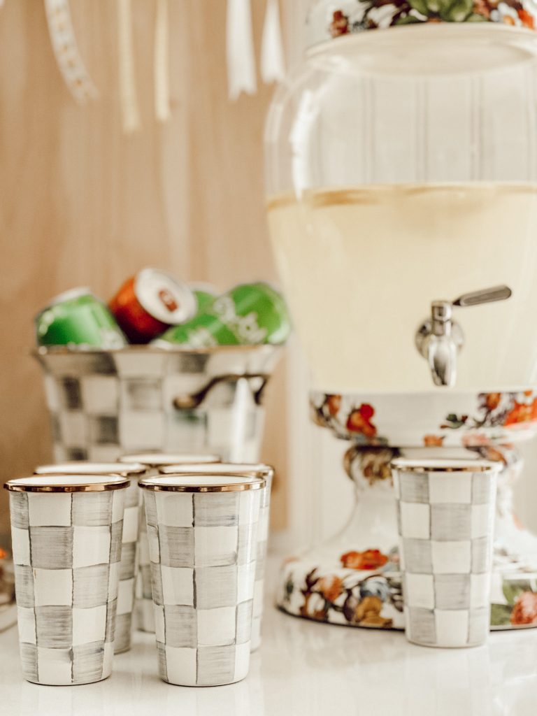 Serve refreshing lemonade in a drink dispenser so guests can easily pour their own drinks.