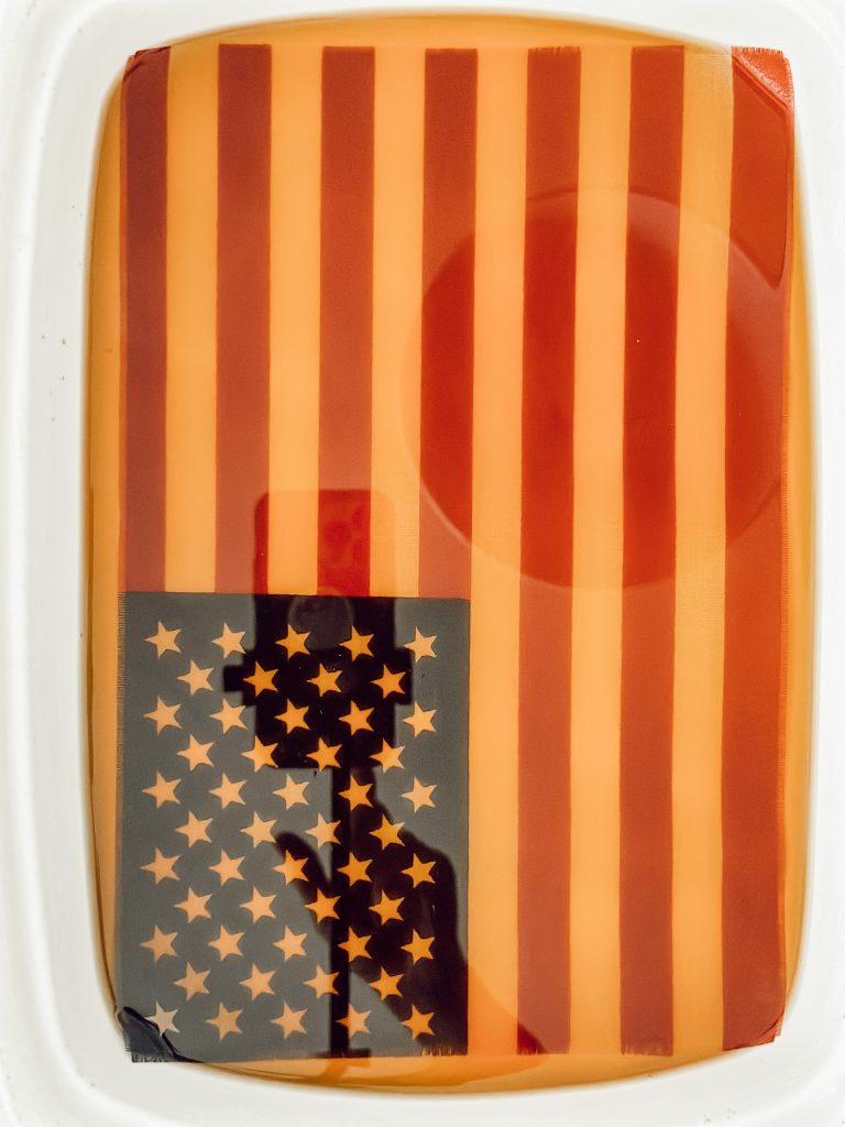 Tea staining the American flag to make it look vintage inspired.