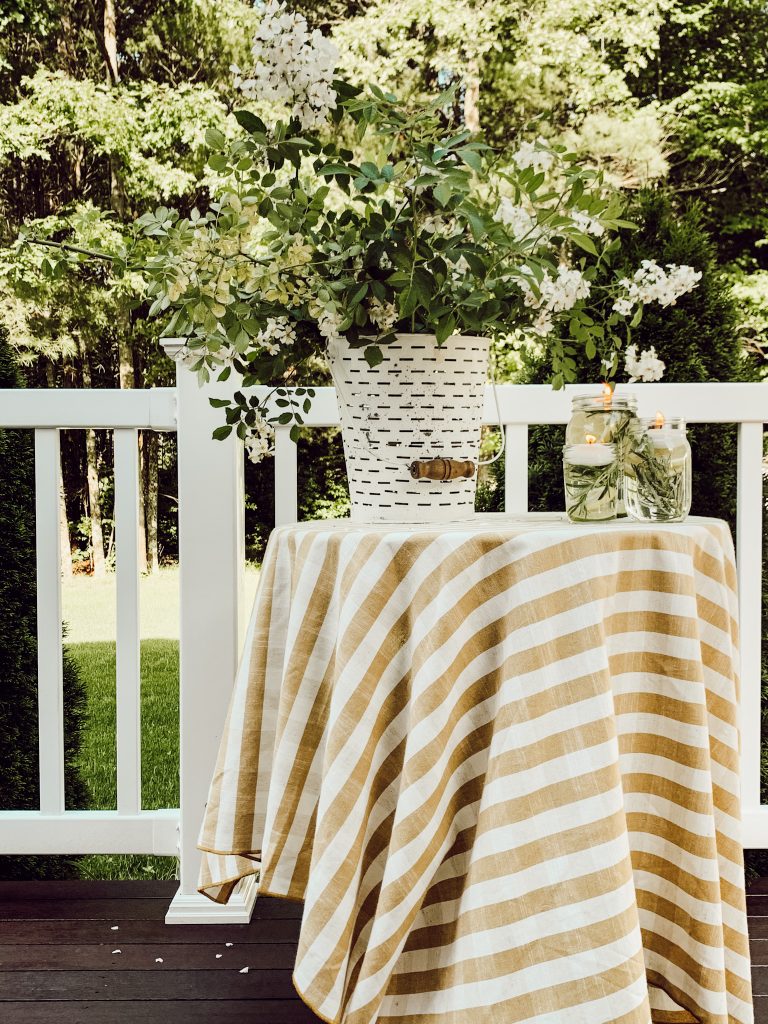 Unique uses for herbs with these DIY citronella candles for outdoor entertaining.