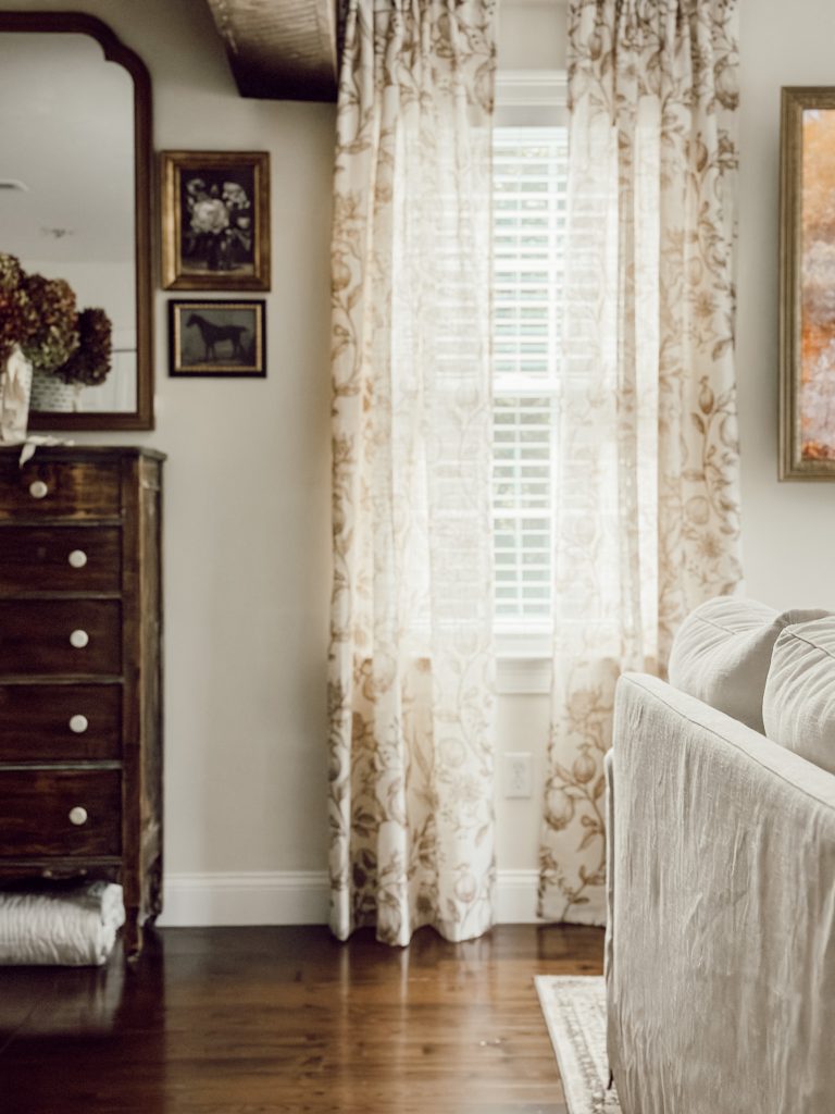 Toile print linen window treatments from Amazon that will add warmth & coziness to your living room.