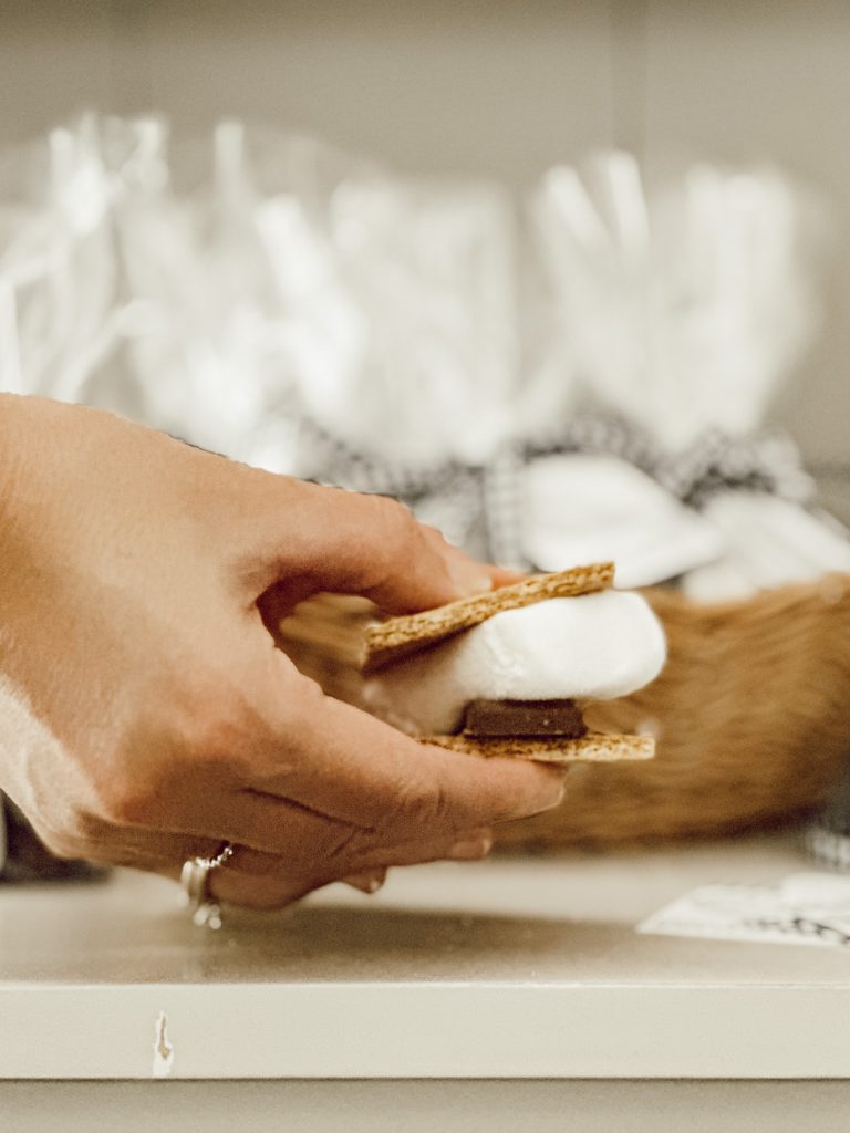 Make a s'mores snack with Peeps, chocolate candy bars, and graham cracker squares.
