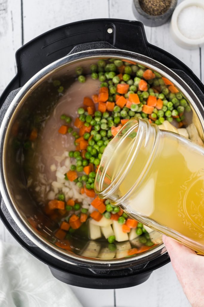 Homemade chicken pot pie recipe made in the pressure cooker with low sodium chicken stock.