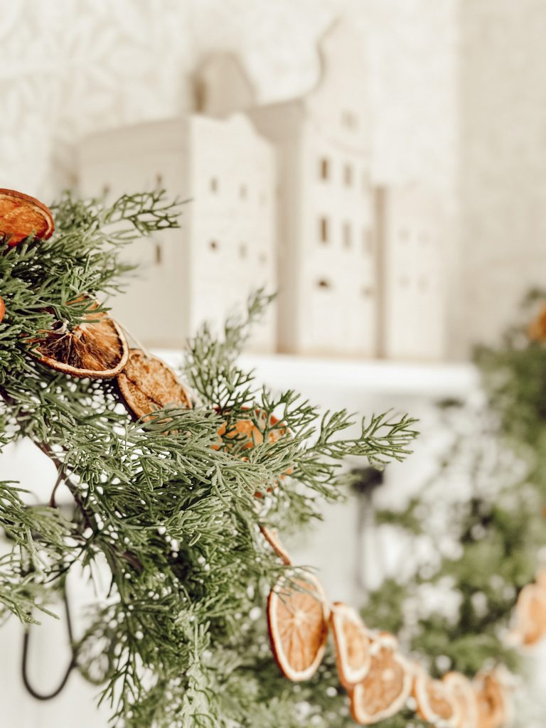 Add classic pieces to your holiday home decor like vintage ornaments, green garlands, and natural elements.