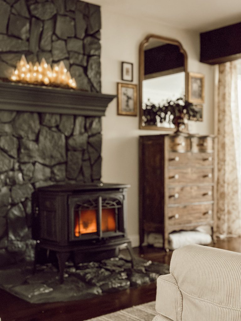 DIY Christmas decoration displayed on fireplace mantle for a winter wonderland.